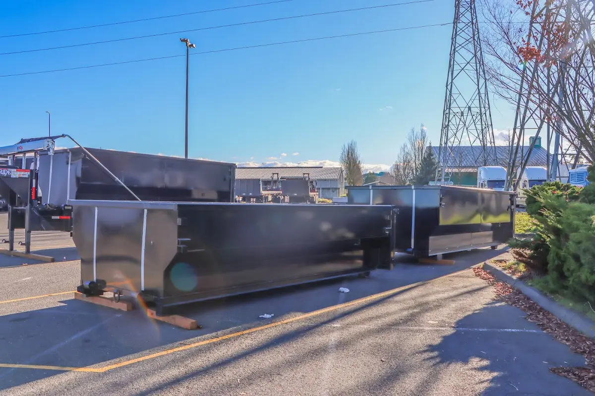 Roll-off dumpster ready for waste disposal at job site for 2 Yard Dumpster Rental in Lakeside